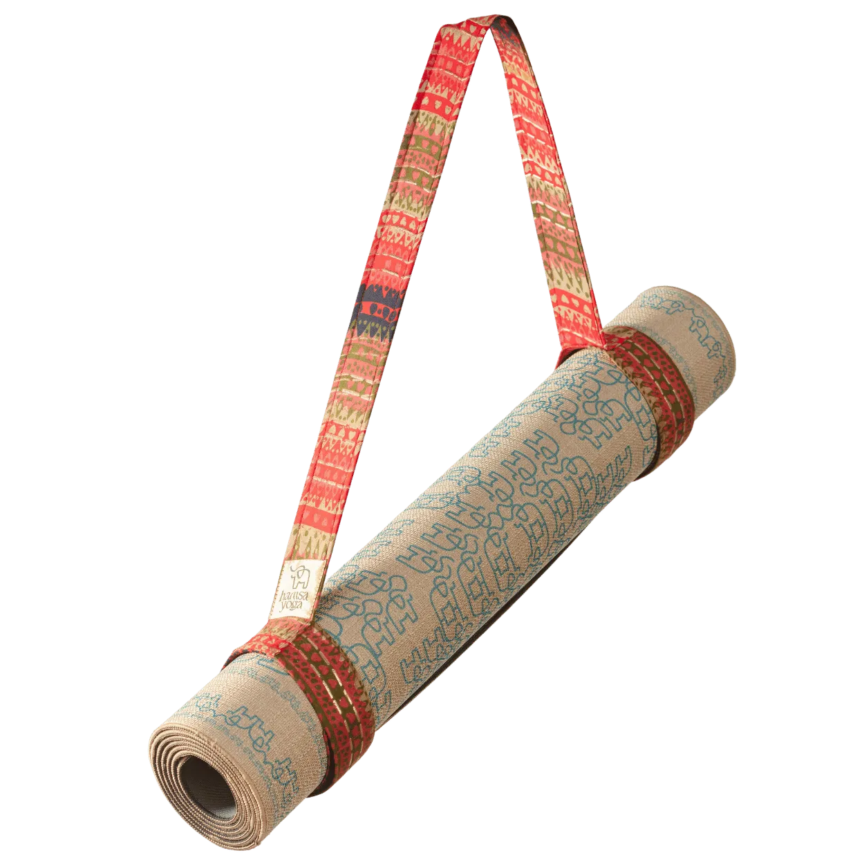 Yogamatten-Tragegurt Pitta befestigt an Yogamatte – handgewebter Gurt für einfachen Transport.